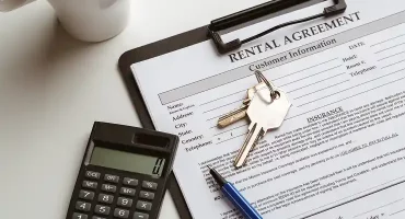 rental-agreement-with-keys-calculator-and-coffee-2026-01-08-22-34-29-utc 1